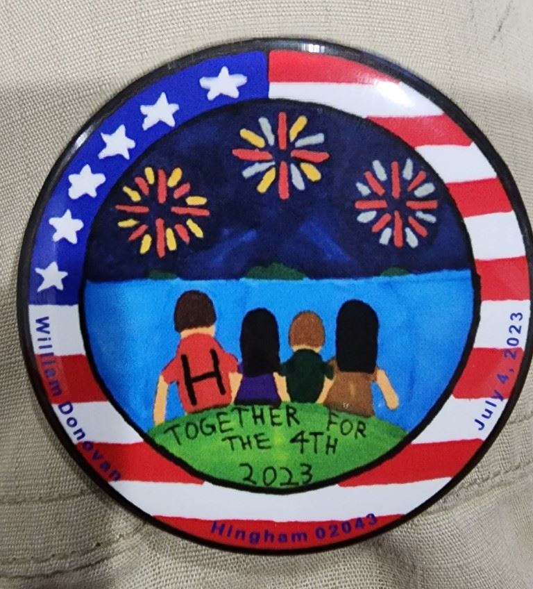 Parade Button showing people watching fireworks