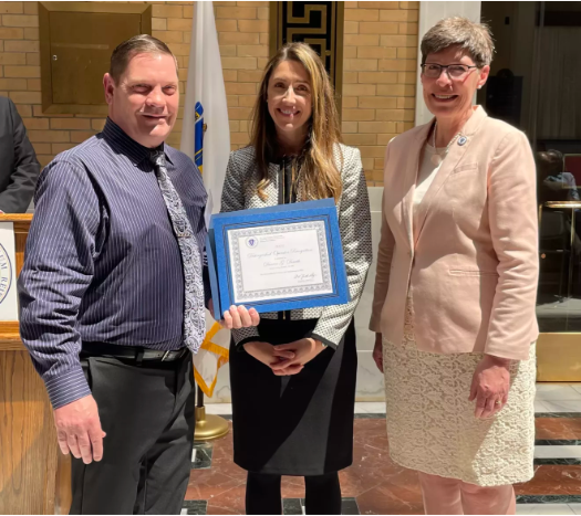 Three people receive award
